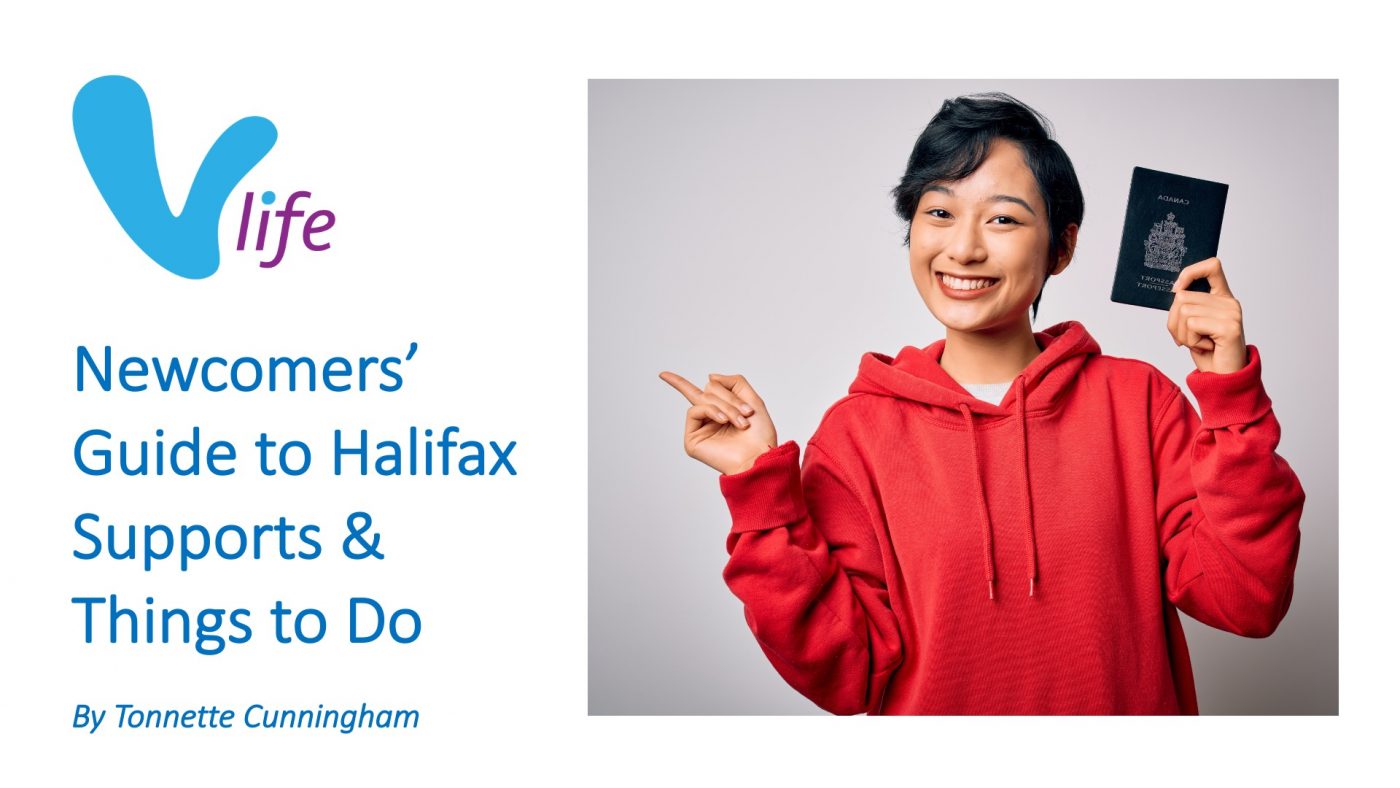 Smiling Asian woman holding a Canadian Passport pointing to vLife Blog: Newcomers Guide to Halifax. Supports & Things To Do.